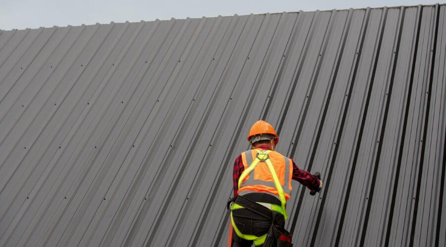 Professional metal roof installation services in Ochelata, OK
